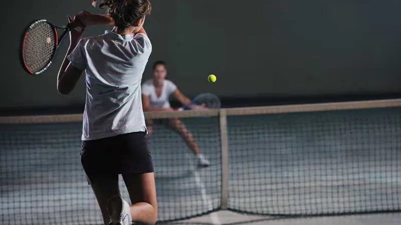 Women playing tennis